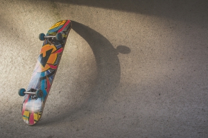 f326e-Canva---Multicolored-Skateboard-Leaning-on-Wall.jpg